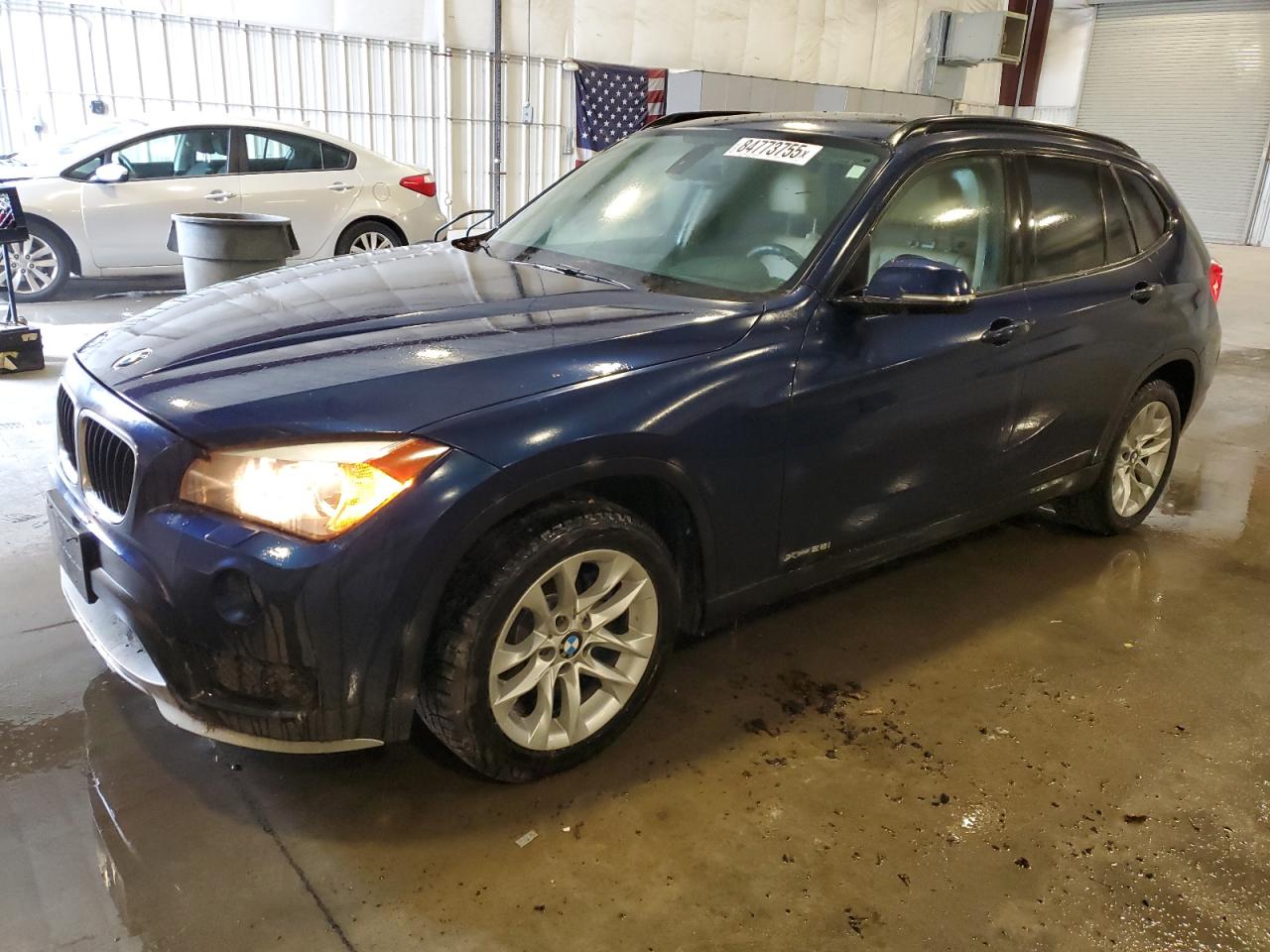 2015 BMW X1 xDrive28i, VIN WBAVL1C51FVY31607 — Minor dents and scratches