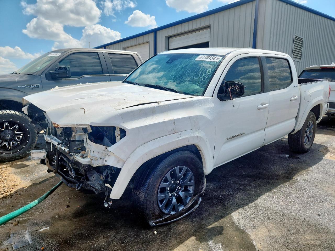 2023 Toyota Tacoma SR, VIN 3TMCZ5AN2PM593958 — Front end