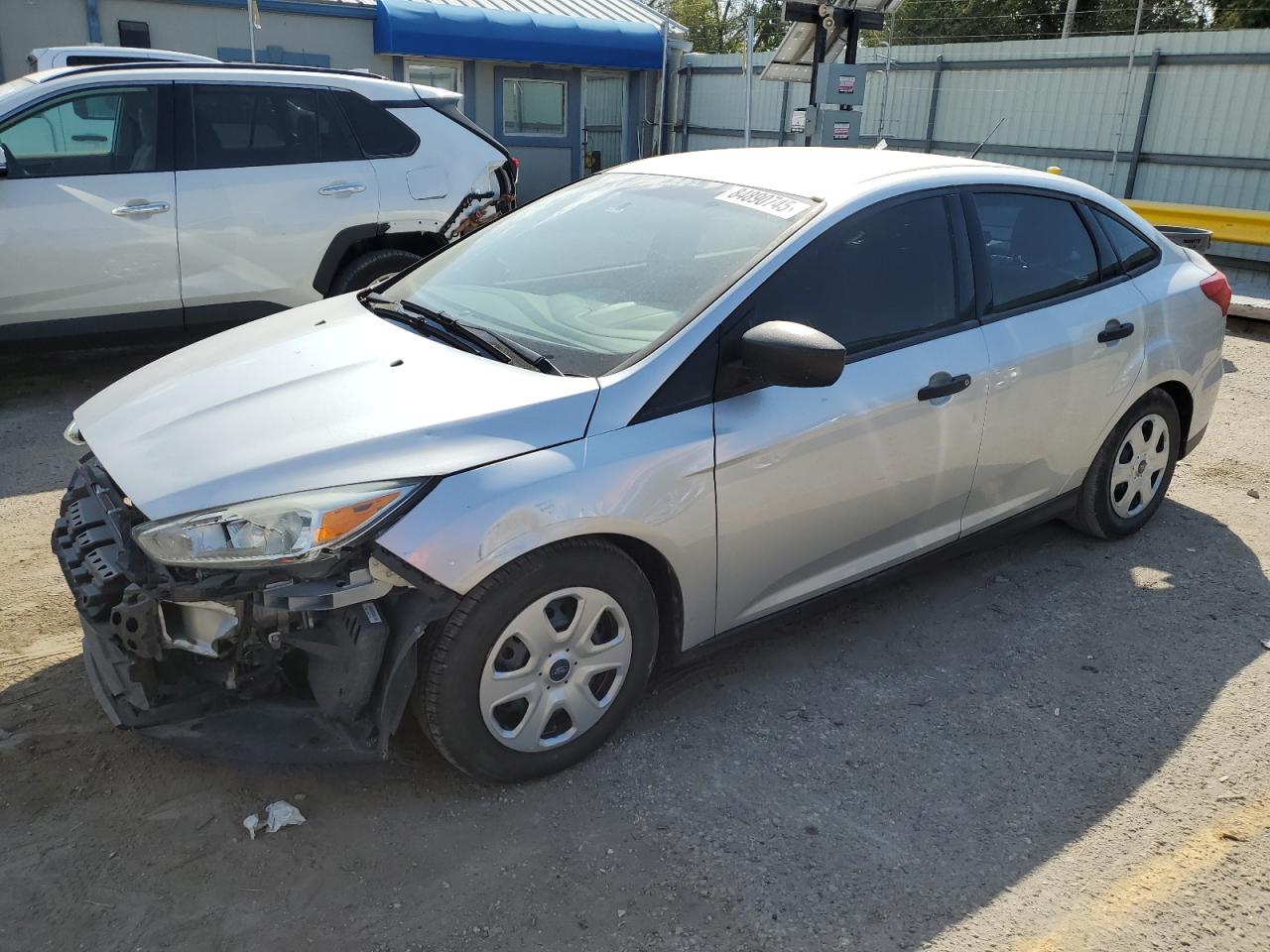 2015 Ford Focus S, VIN 1FADP3E27FL275015 — Фото с аукциона