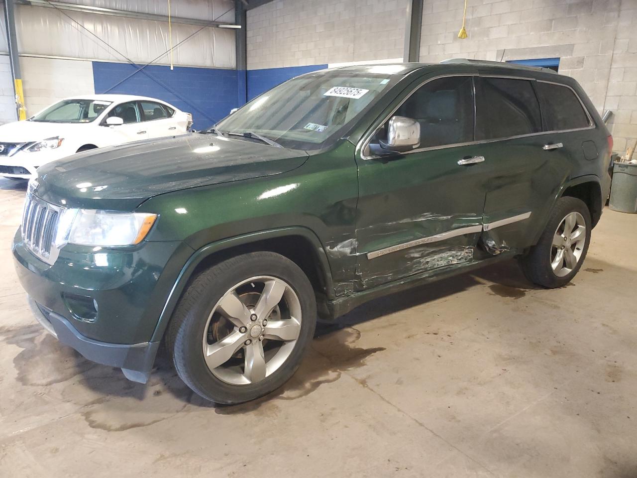 2011 Jeep Grand Cherokee Limited, VIN 1J4RR5GG0BC612711 — Side