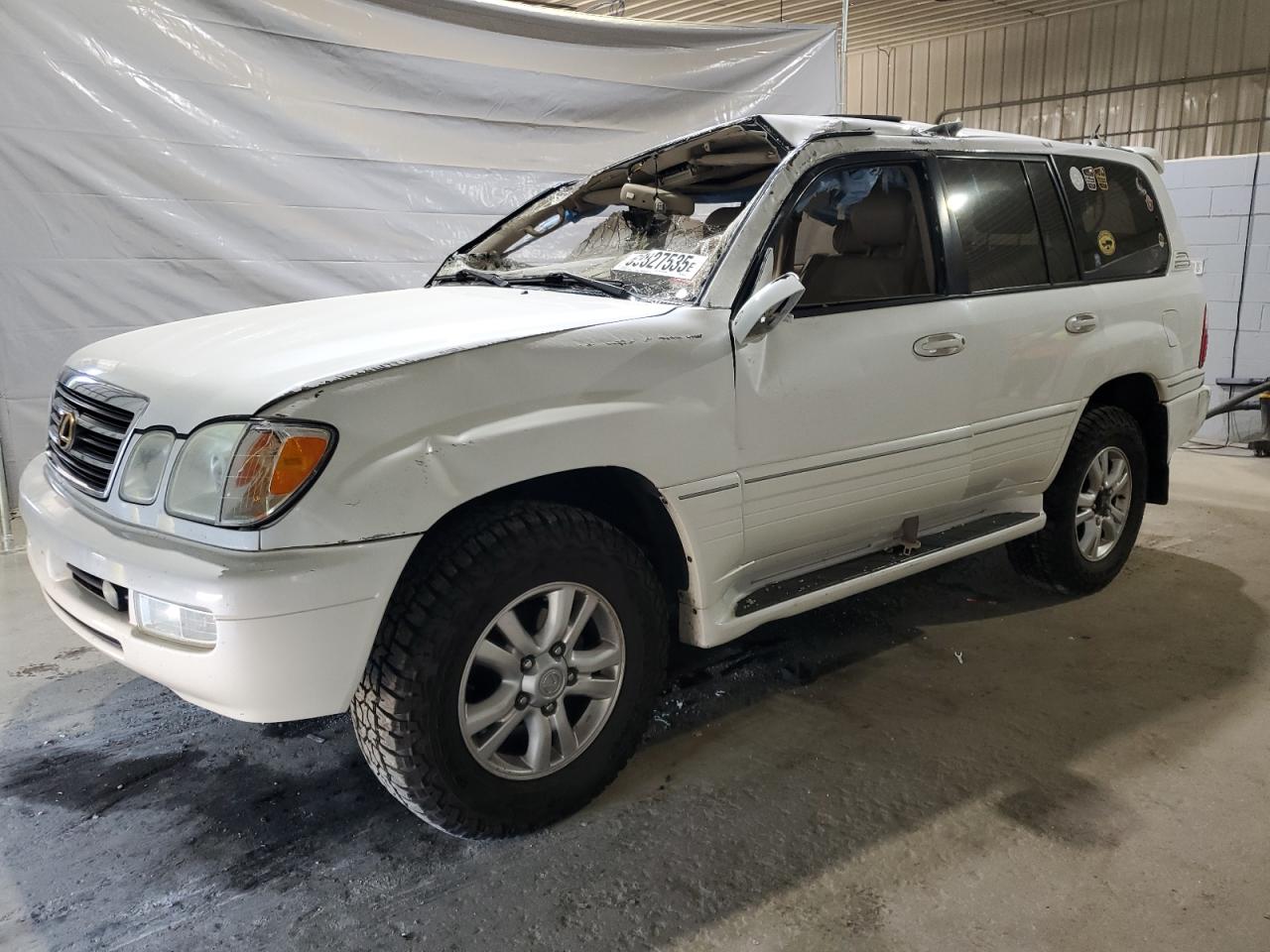 2003 Lexus LX 470, VIN JTJHT00W133528189 — Rollover