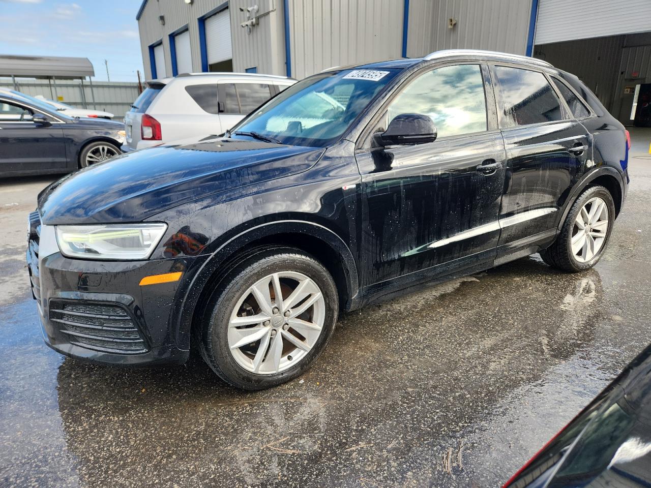 2018 Audi Q3 Premium, VIN WA1BCCFS7JR003947 — Minor dents and scratches