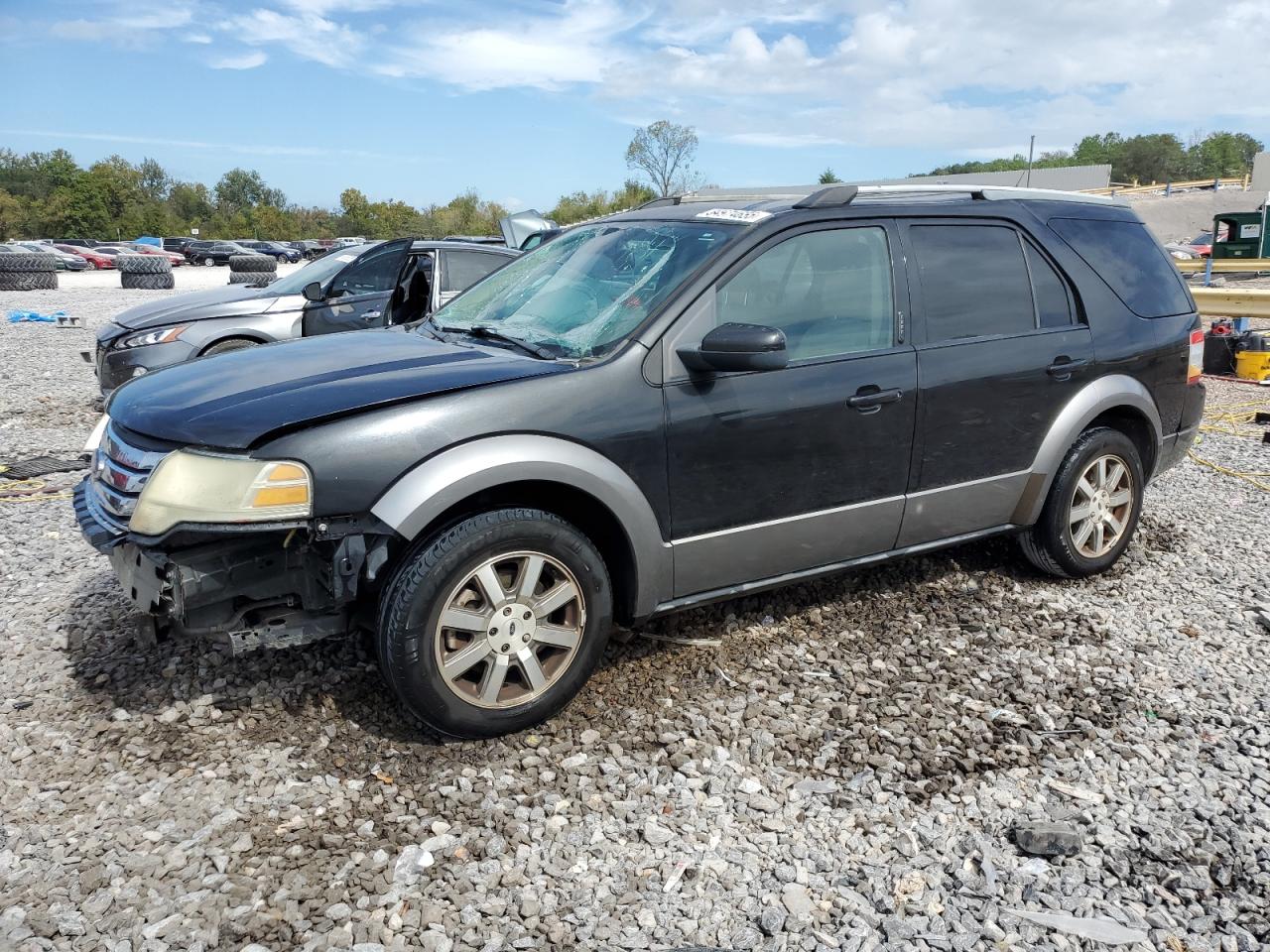 2009 Ford Taurus X SEL, VIN 1FMDK02W29GA03382 — Фото с аукциона