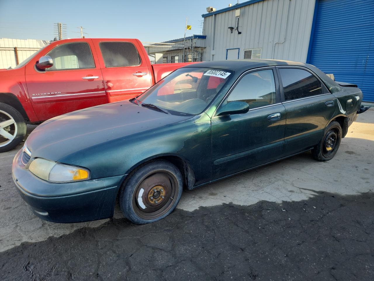 1999 Mazda 626 ES, VIN 1YVGF22C9X5898539 — Rear end