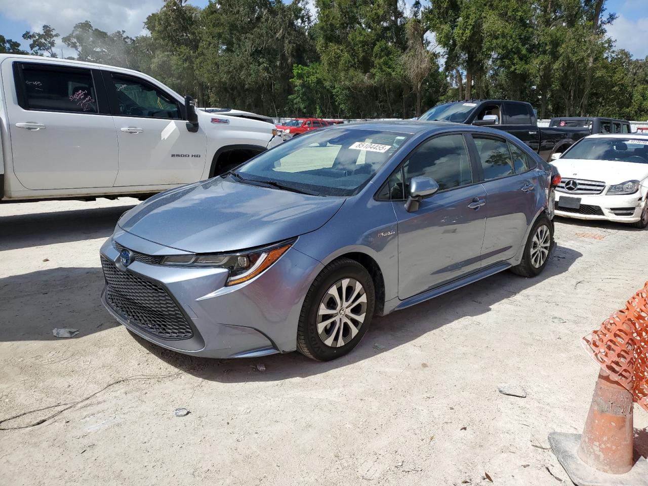 2021 Toyota Corolla Hybrid LE, VIN JTDEAMDEXMJ024399 — Rear end