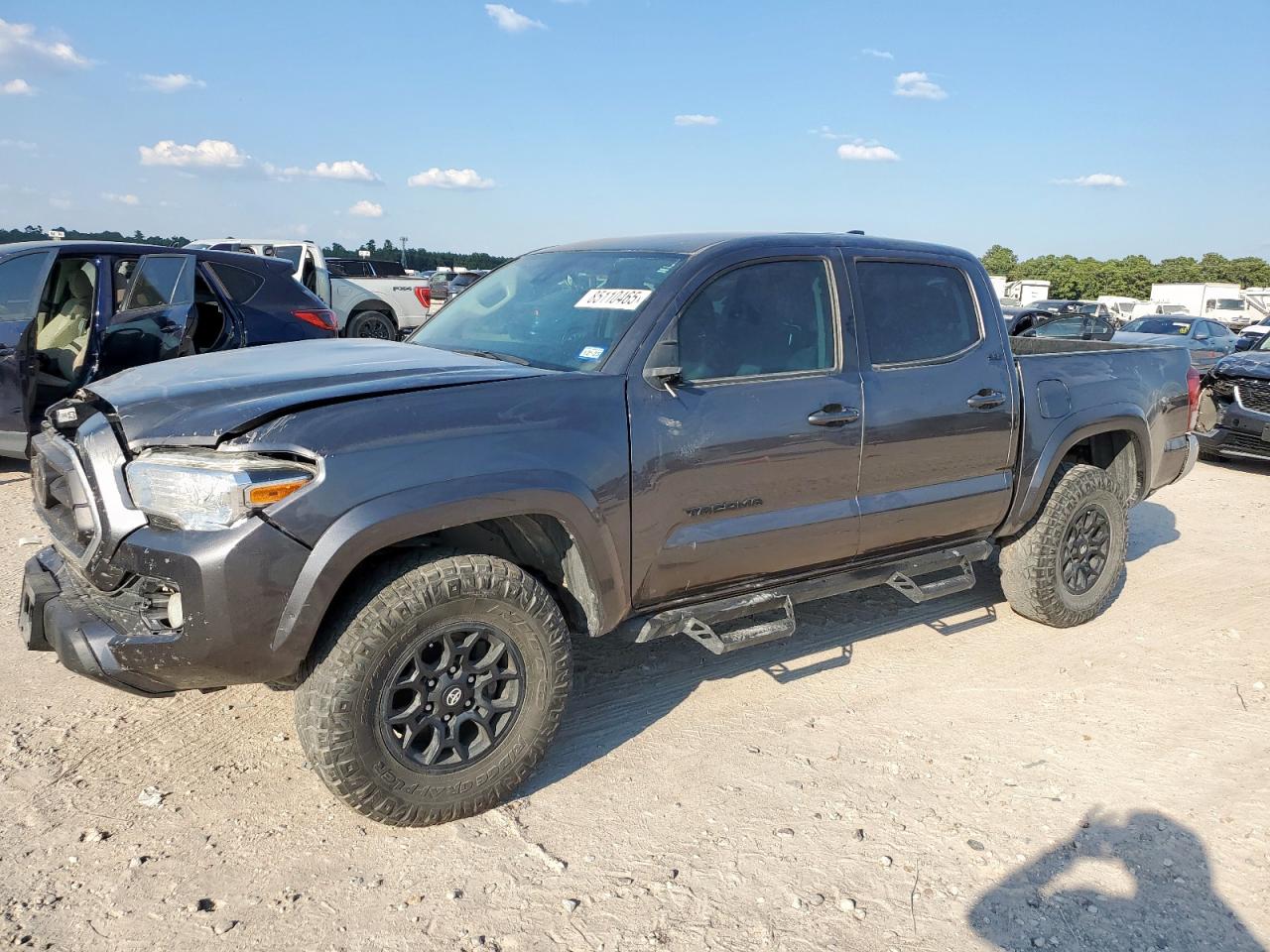 2021 Toyota Tacoma SR5, VIN 5TFAZ5CNXMX103678 — Front end