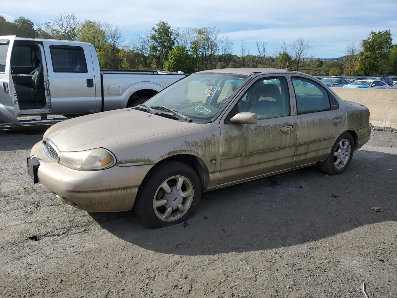1999 Ford Contour SE, VIN 1FAFP6634XK189850 — Front end