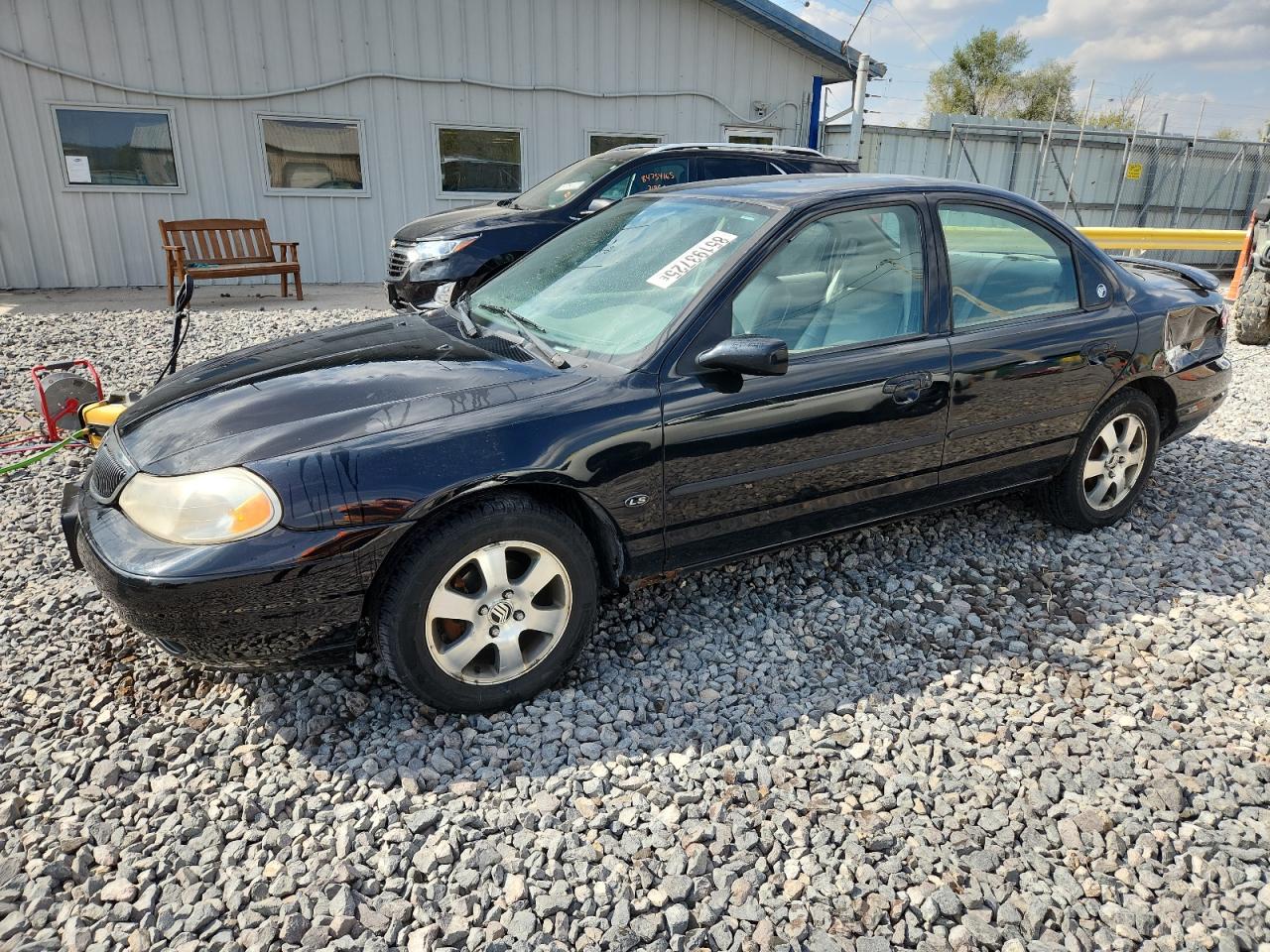 1999 Mercury Mystique, VIN 1MEFM66L7XK610610 — Rear end