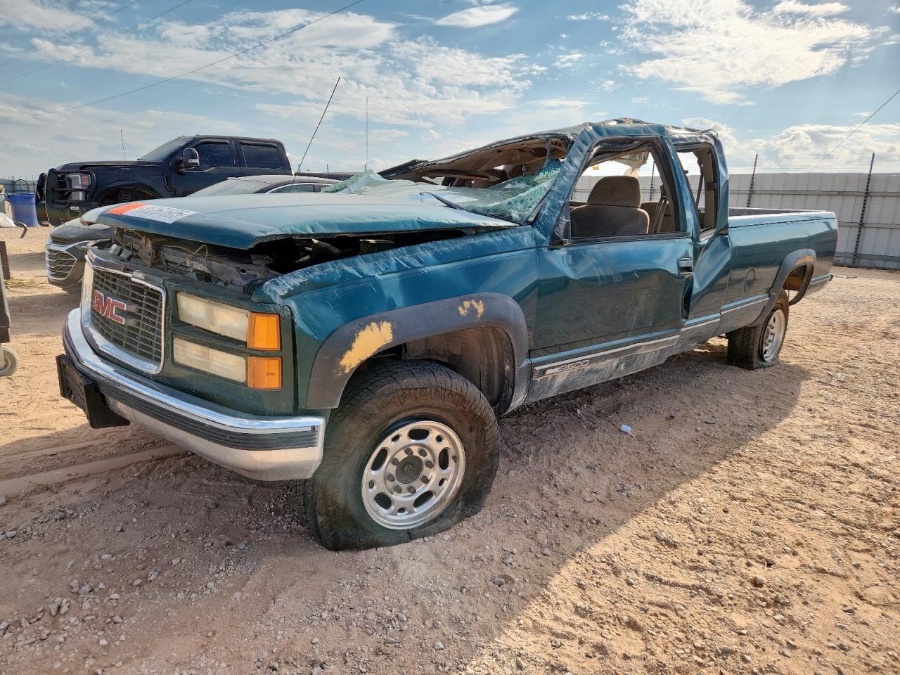 1998 GMC Sierra 2500, VIN 1GTGK29R5WE520289 — Rollover