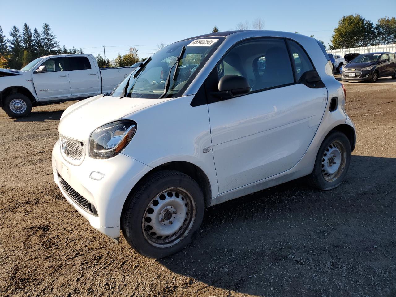 2016 Smart fortwo Passion, VIN WMEFJ5DA9GK155072 — Side