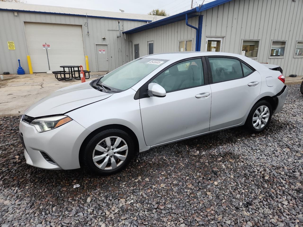 2015 Toyota Corolla LE, VIN 5YFBURHE0FP209819 — Rear end