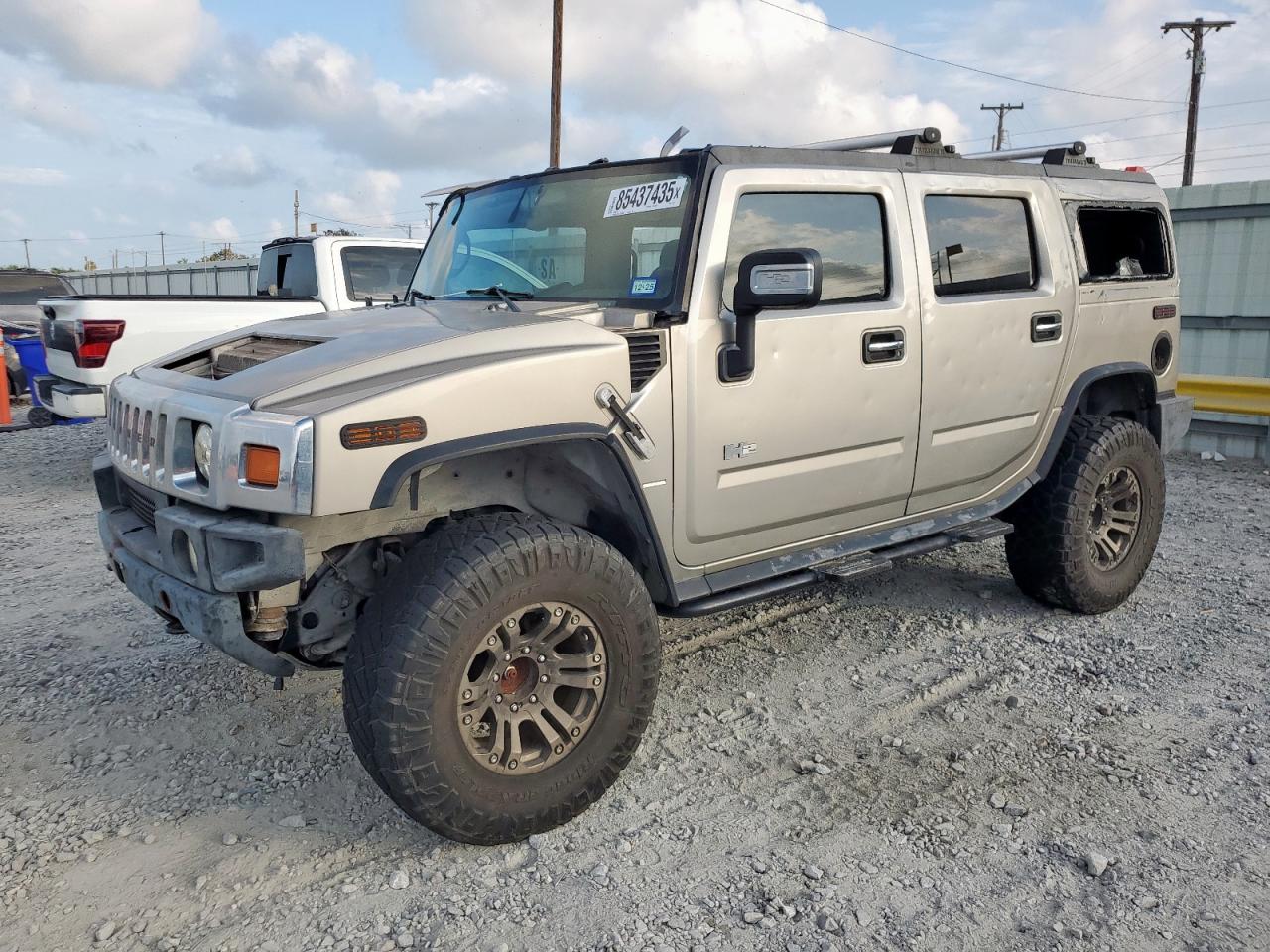 2007 Hummer H2 SUV, VIN 5GRGN23U27H112321 — Hail