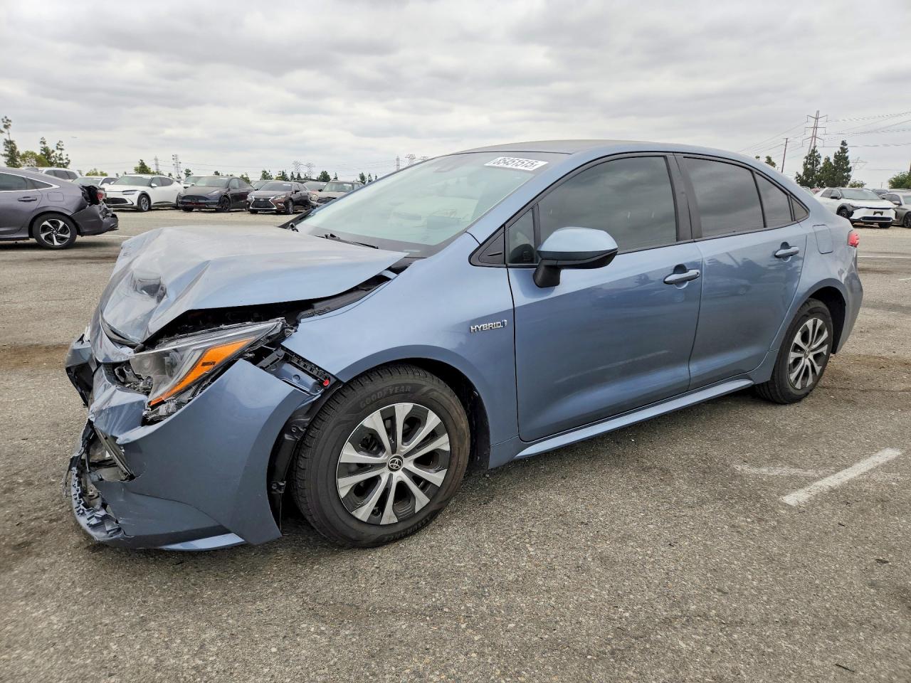 2021 Toyota Corolla Hybrid LE, VIN JTDEAMDEXMJ028503 — Front end
