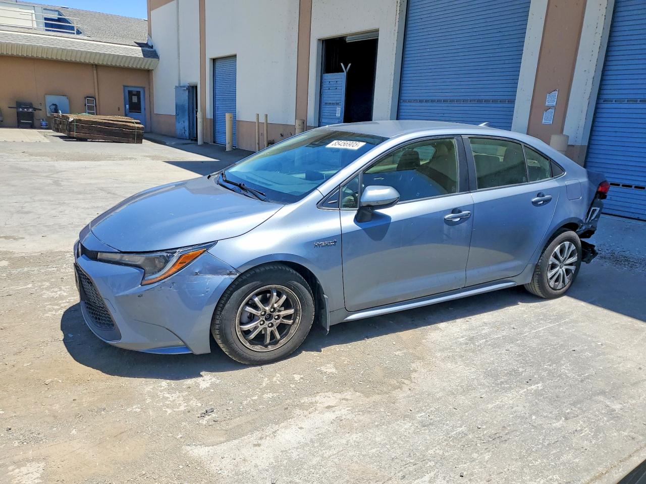 2021 Toyota Corolla Hybrid LE, VIN JTDEAMDE0MJ010060 — Front end