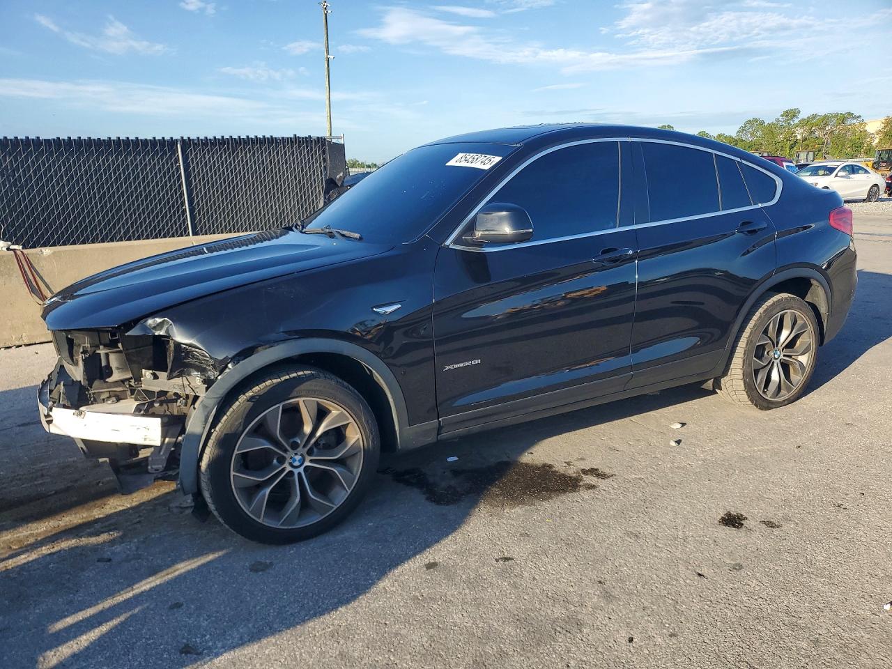 2015 BMW X4 xDrive28i, VIN 5UXXW3C5XF0M88080 — Front end