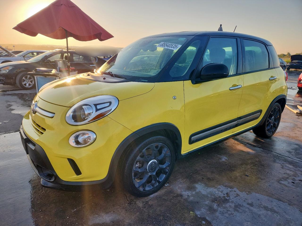 2015 FIAT 500L Urbana Trekking, VIN ZFBCFADHXFZ031670 — Side