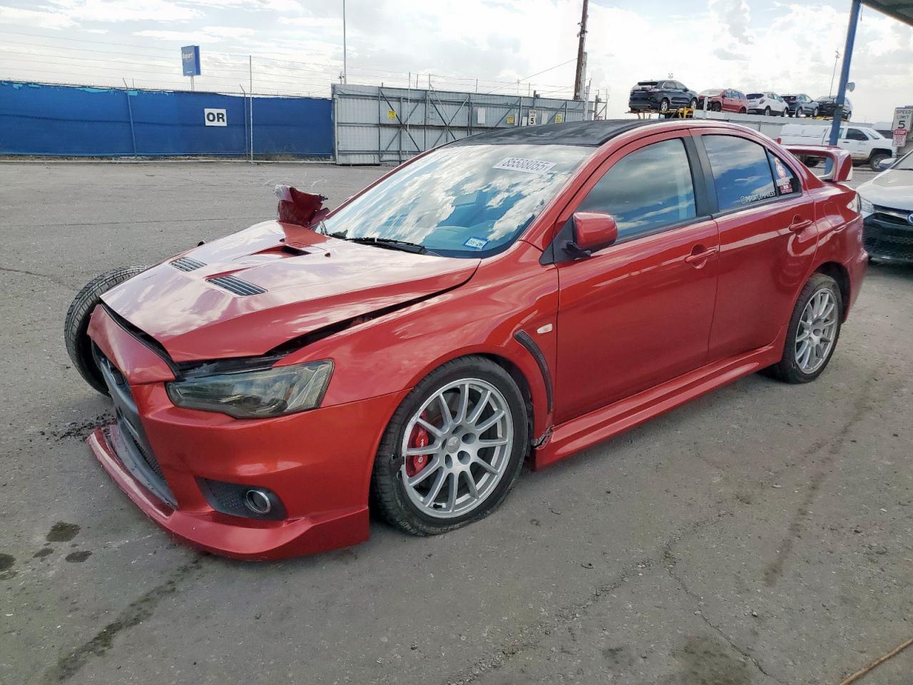 2013 Mitsubishi Lancer Evolution GSR, VIN JA32W8FV4DU017213 — Front end