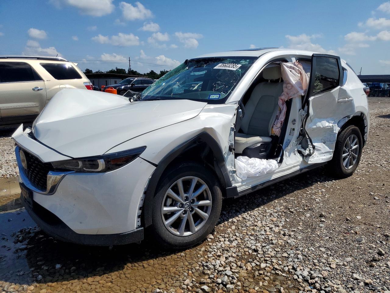 2023 Mazda CX-5 S Preferred, VIN JM3KFBCM2P0233784 — Бок