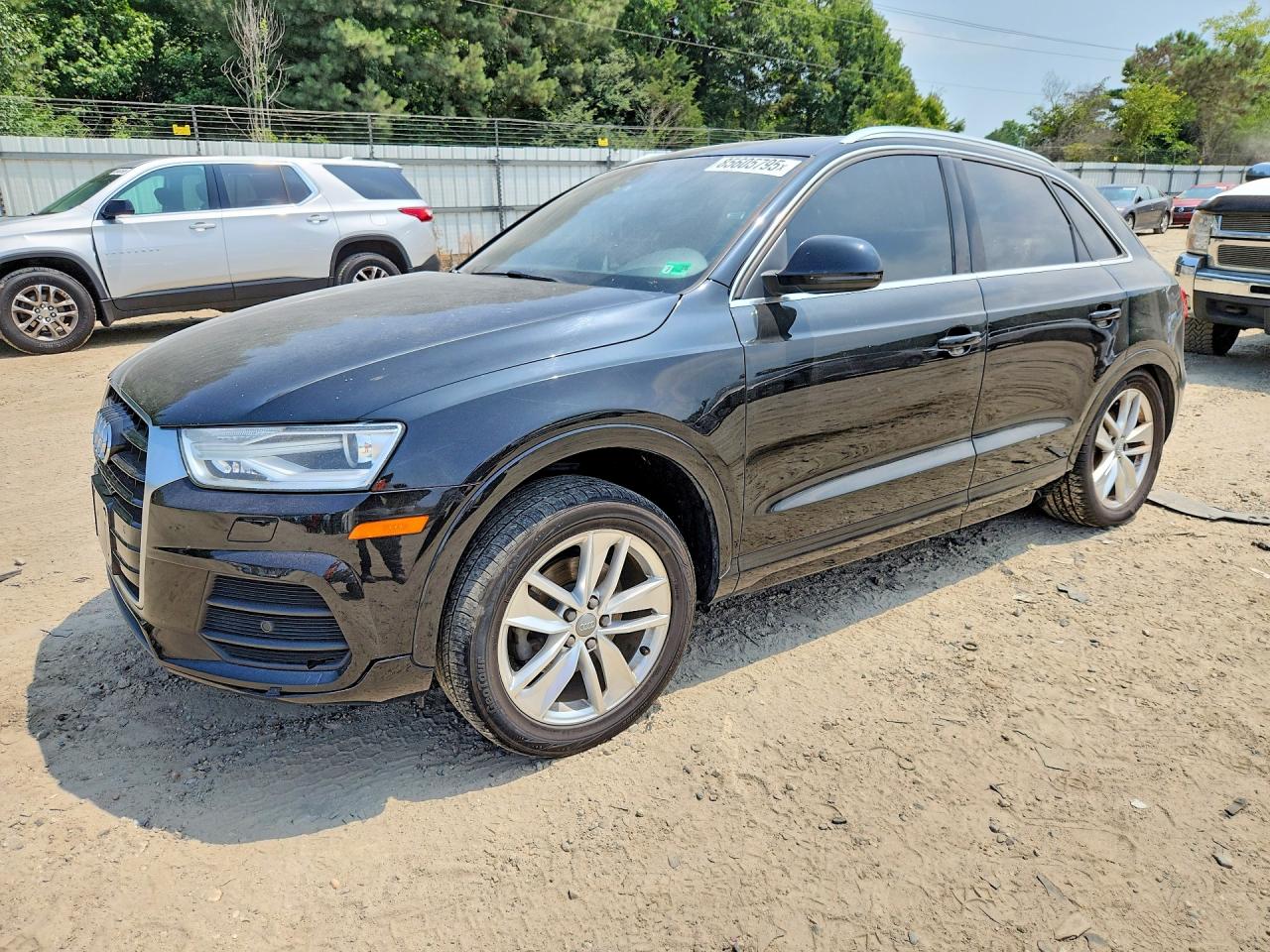 2016 Audi Q3 Premium Plus, VIN WA1EFCFS2GR015727 — Rear end