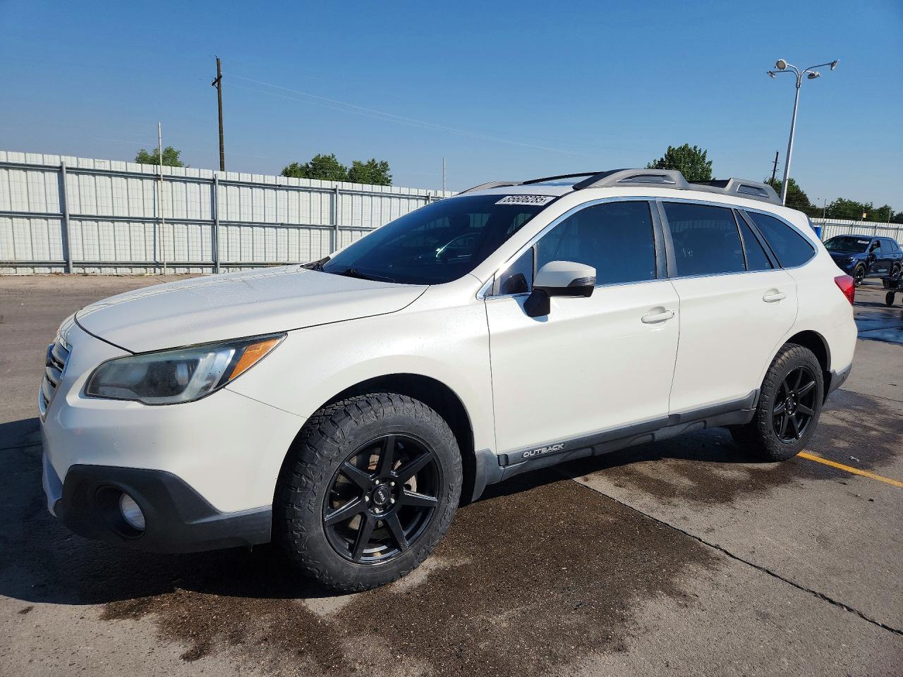 2016 Subaru Outback Limited, VIN 4S4BSBNCXG3301610 — Hail