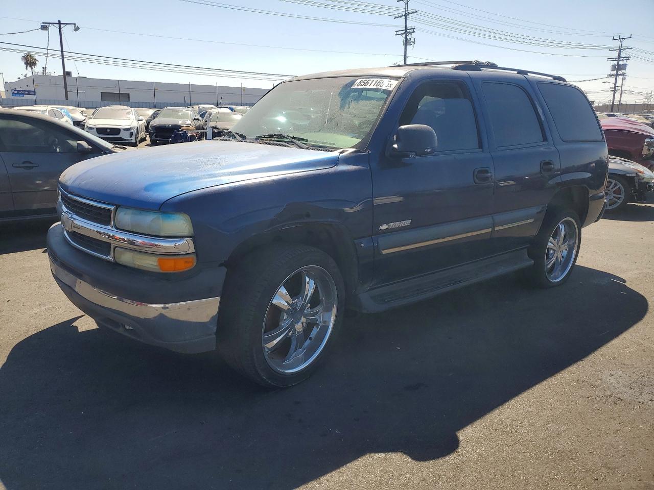 2003 Chevrolet Tahoe LT, VIN 1GNEC13T93R239188 — Side