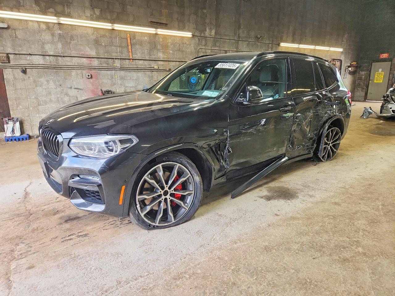 2021 BMW X3 M40i, VIN 5UXTY9C09M9G18457 — Side