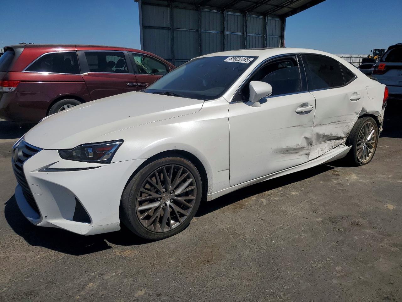 2017 Lexus IS 200t, VIN JTHBA1D23H5055871 — Бок