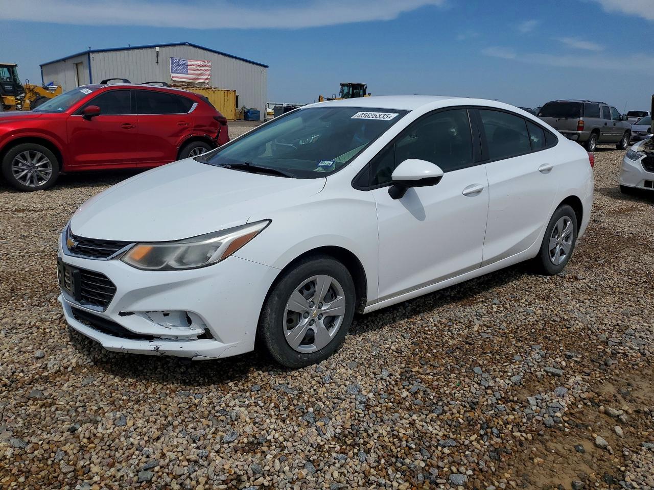 2018 Chevrolet Cruze LS, VIN 1G1BC5SM9J7227590 — Side