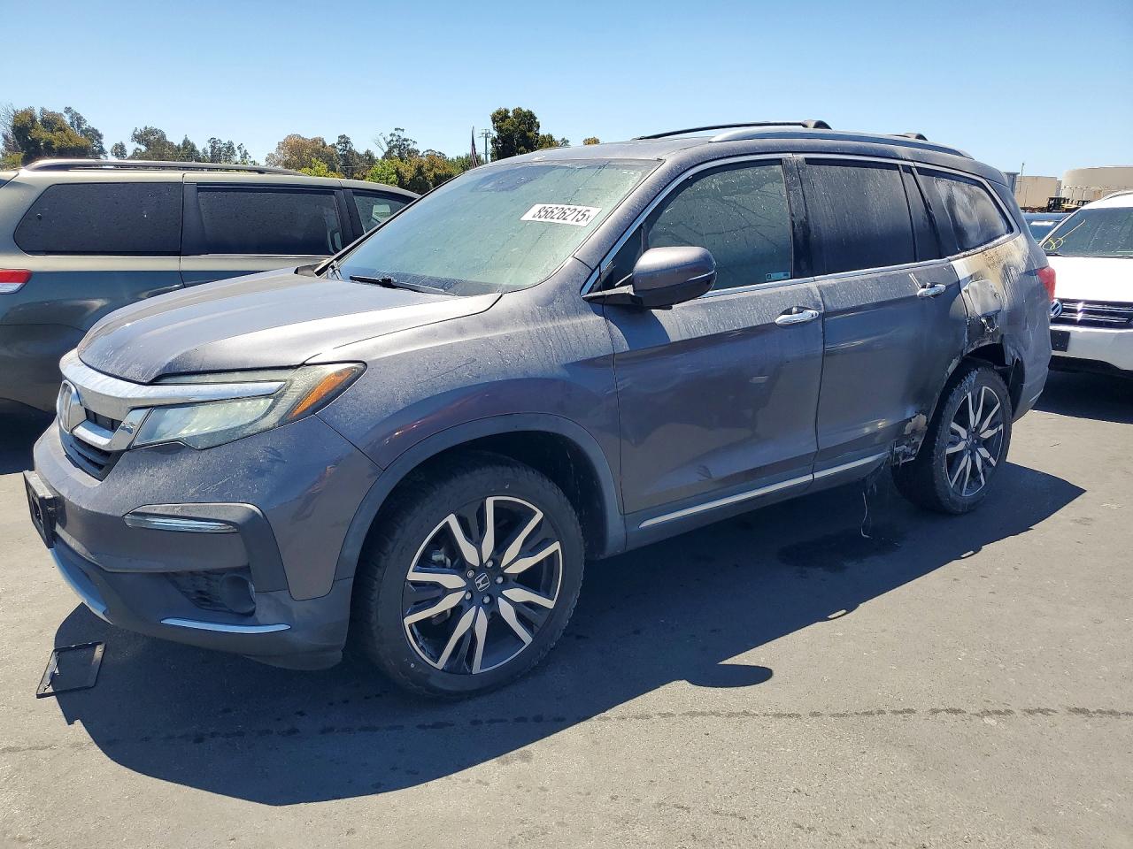 2020 Honda Pilot Elite, VIN 5FNYF6H00LB005262 — Пожар в салоне
