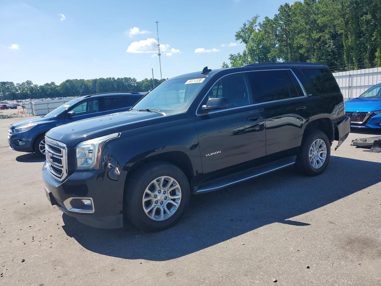 2018 GMC Yukon SLT, VIN 1GKS2BKC4JR303774 — Зад