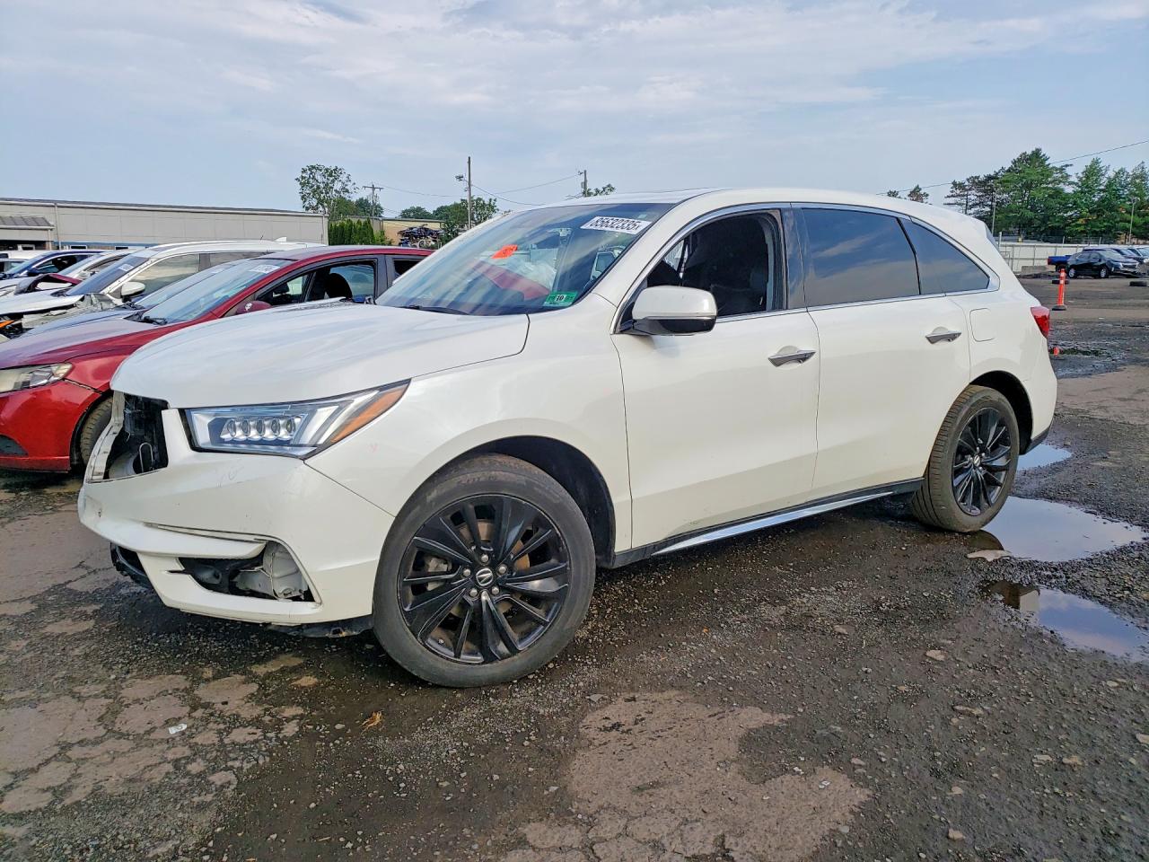 2018 Acura MDX Technology, VIN 5J8YD4H52JL006785 — Side