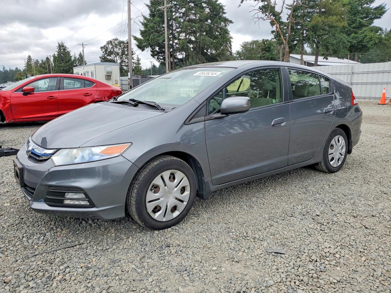 2013 Honda Insight LX, VIN JHMZE2H51DS000974 — Rear end