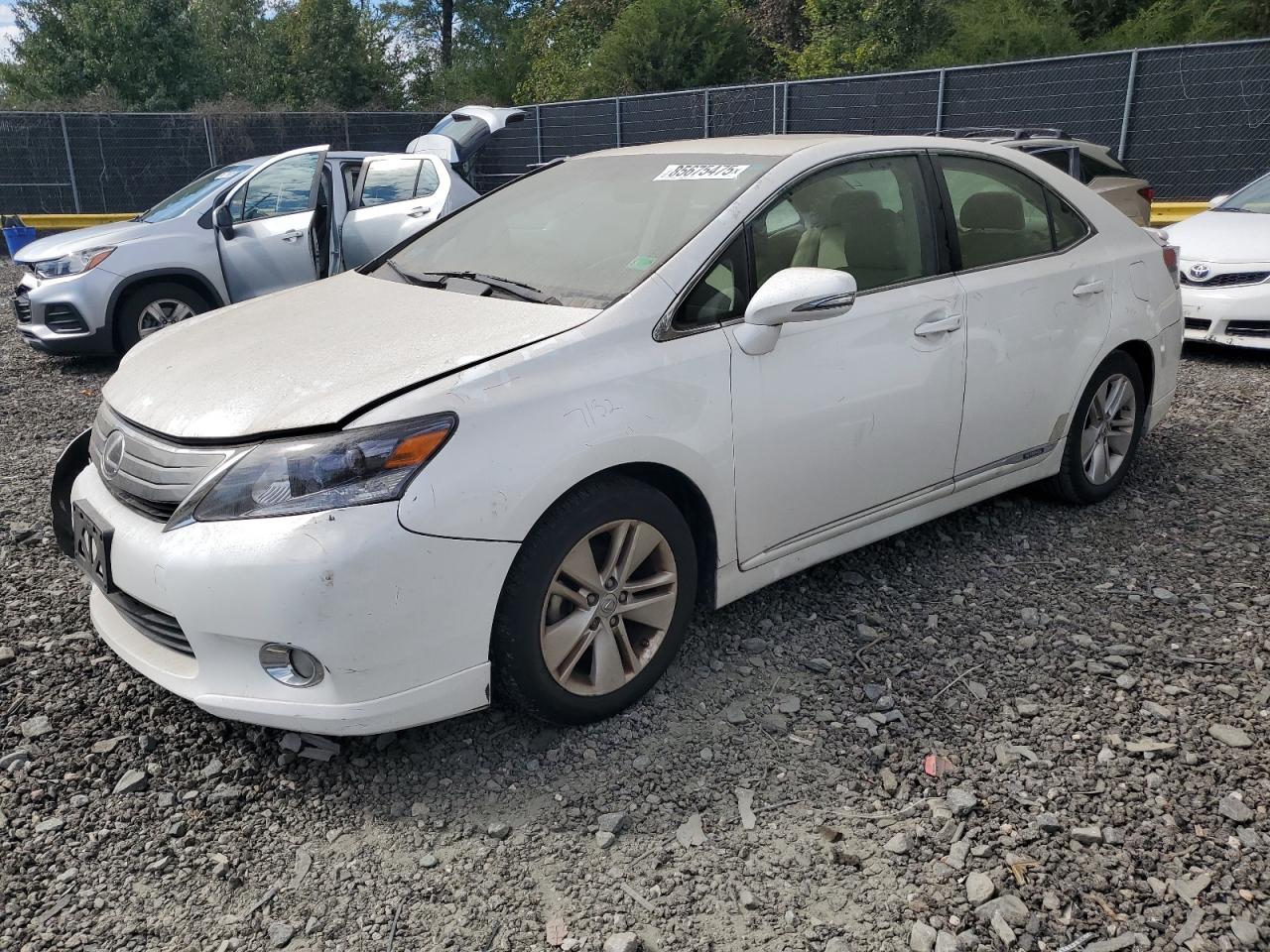 2011 Lexus HS 250h, VIN JTHBB1BA2B2046935 — Перед