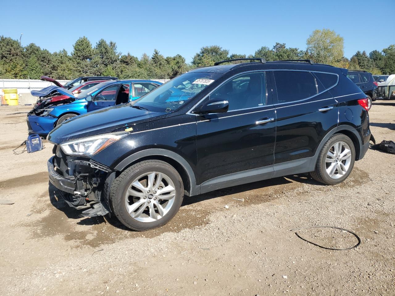 2013 Hyundai Santa Fe Sport, VIN 5XYZU3LA1DG030898 — Front end
