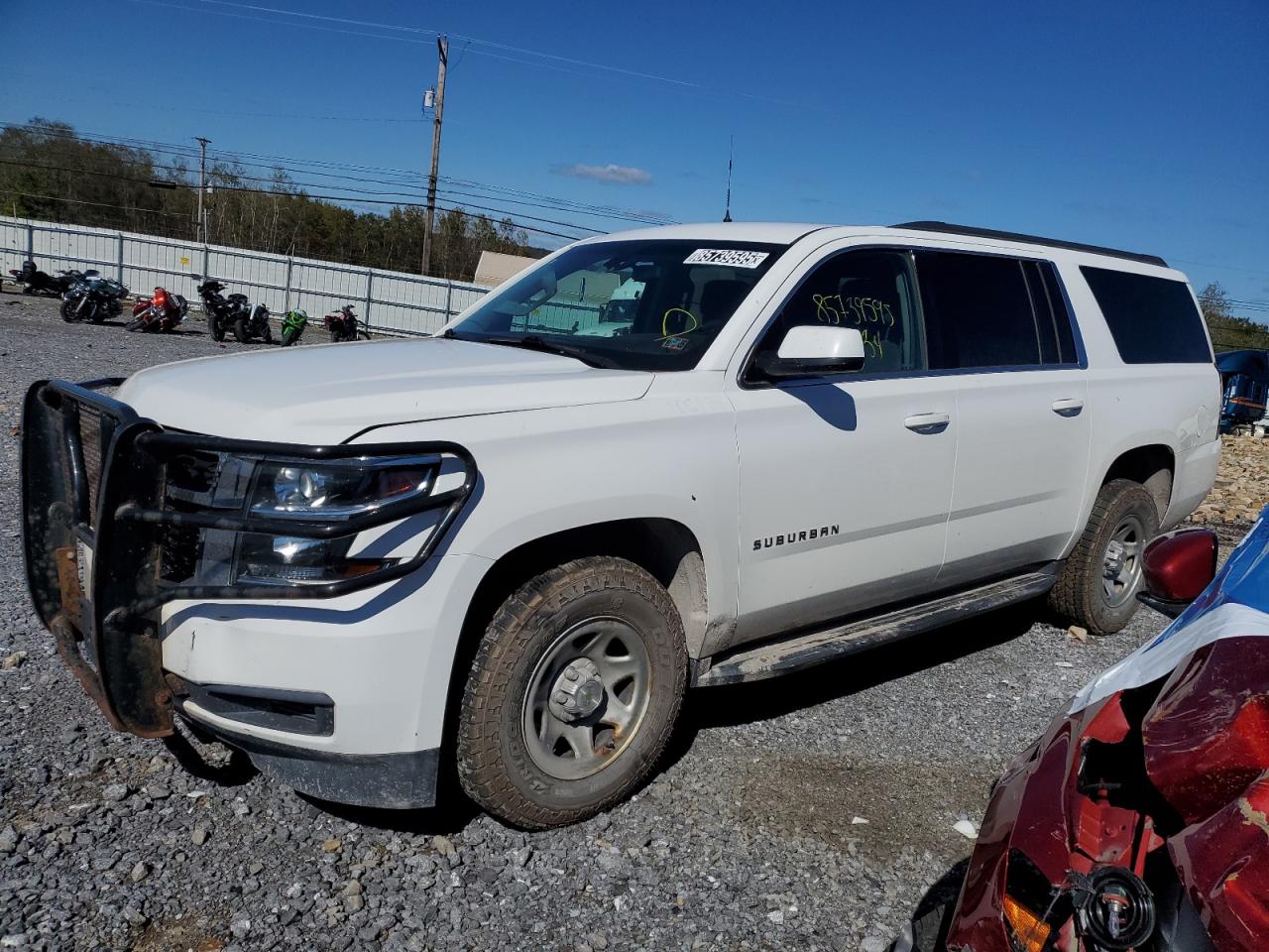 2018 Chevrolet Suburban Commercial, VIN 1GNSKKEC7JR360212 — Front end