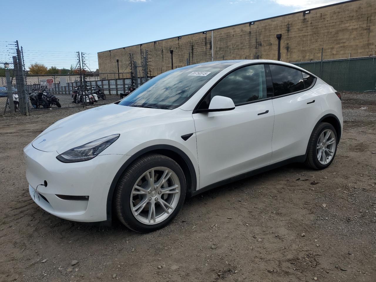 2021 Tesla Model Y Long Range, VIN 5YJYGDEE7MF106303 — Minor dents and scratches