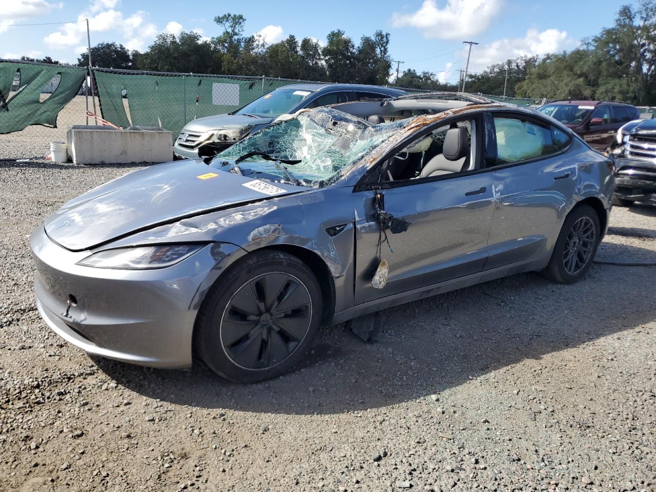 2025 Tesla Model 3 Long Range, VIN 5YJ3E1EA9SF993623 — Опрокидывание