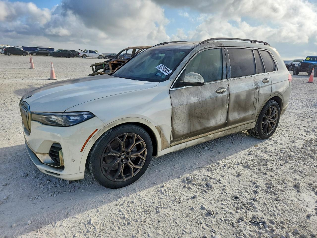2019 BMW X7 xDrive50i, VIN 5UXCX4C55KLS36313 — Burn