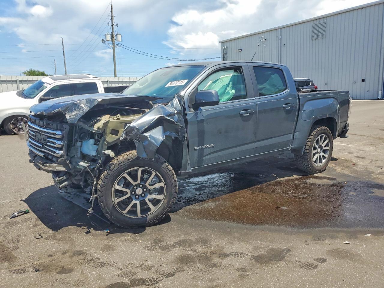 2015 GMC Canyon 2WD SLE, VIN 1GTG5BE39F1249821 — Front end