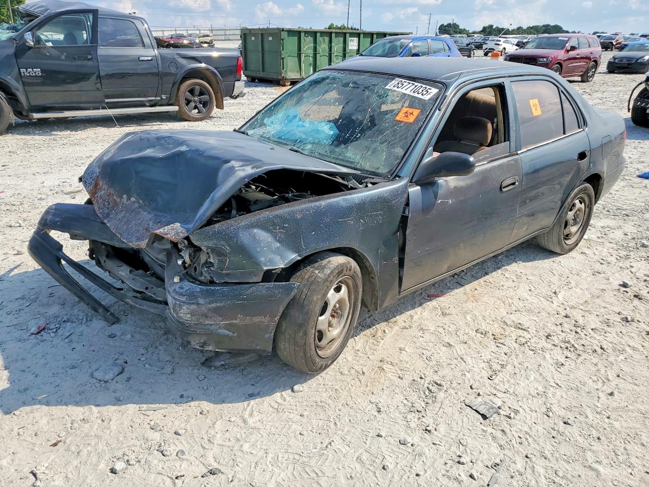 1999 Toyota Corolla CE, VIN 1NXBR12E7XZ170707 — Front end