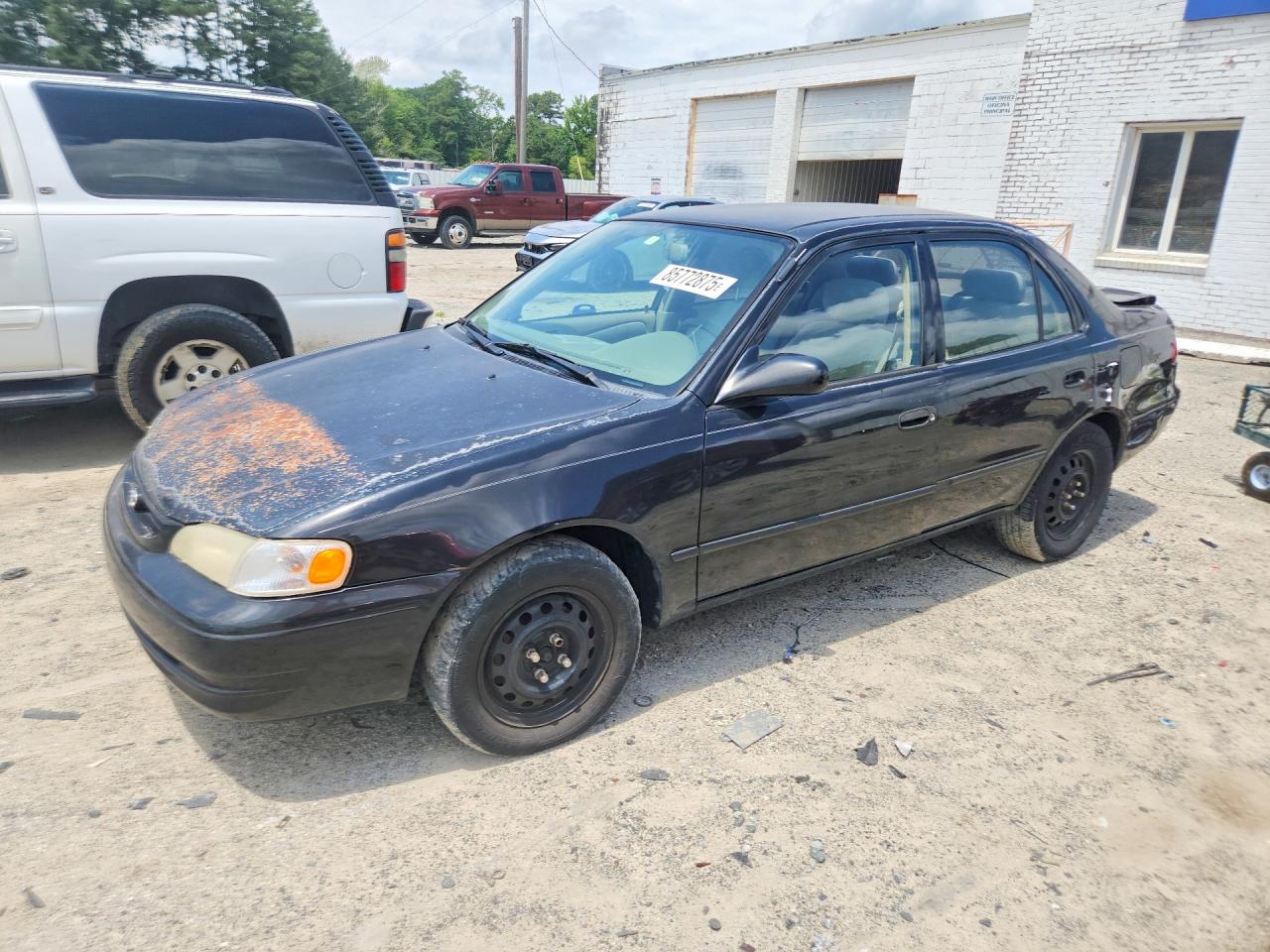 1999 Toyota Corolla CE, VIN 2T1BR12E9XC245392 — Rear end