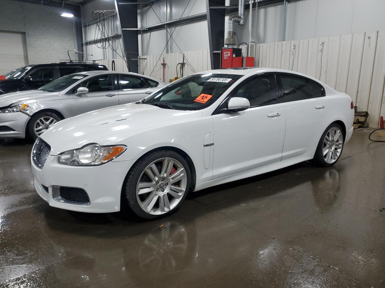 2011 Jaguar XF XFR, VIN SAJWA0JC1BMS08613 — Vandalism