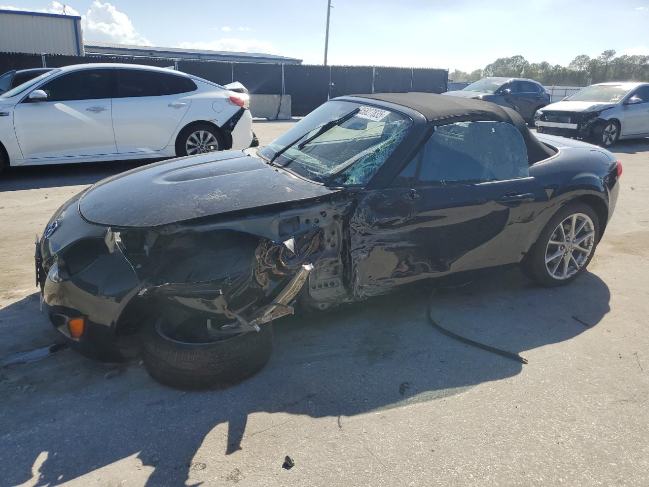 2009 Mazda MX-5 Miata Touring, VIN JM1NC25F390201815 — Front end