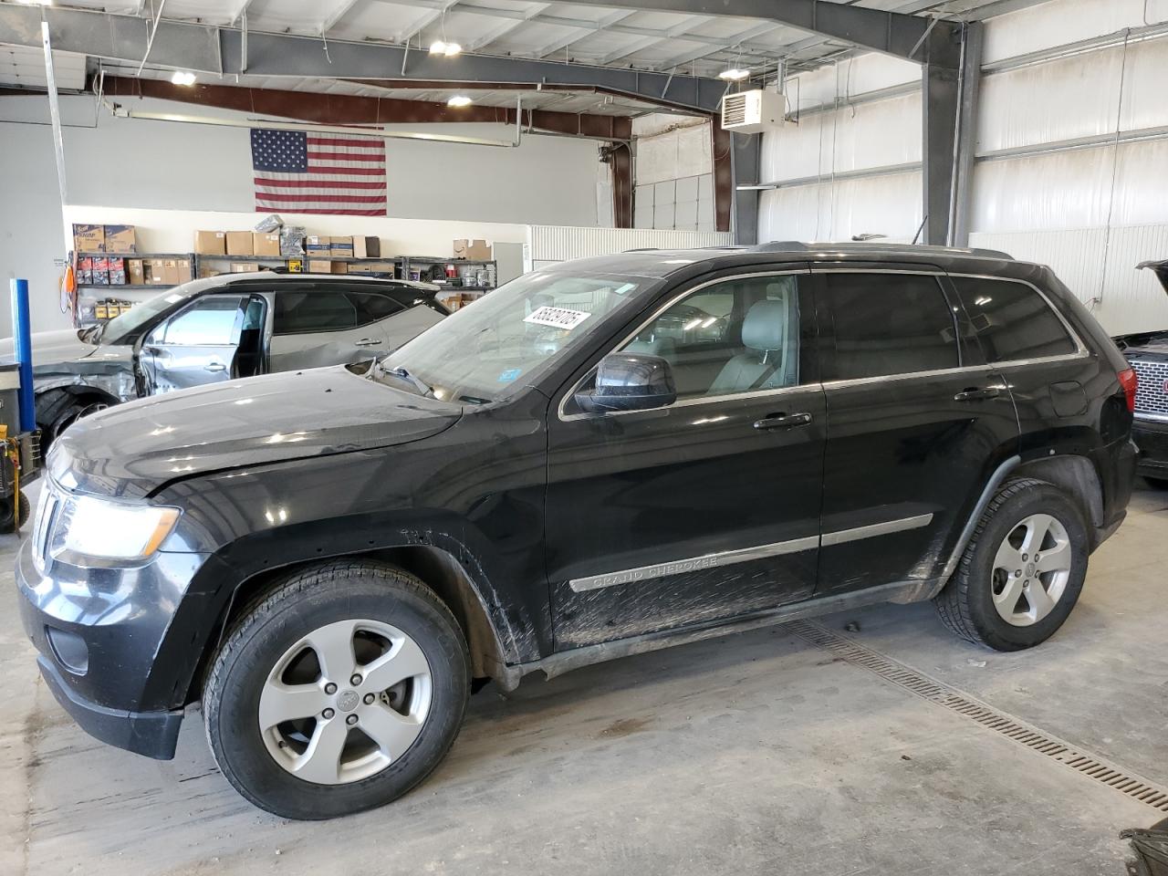 2011 Jeep Grand Cherokee Laredo, VIN 1J4RS4GT0BC636969 — Front end