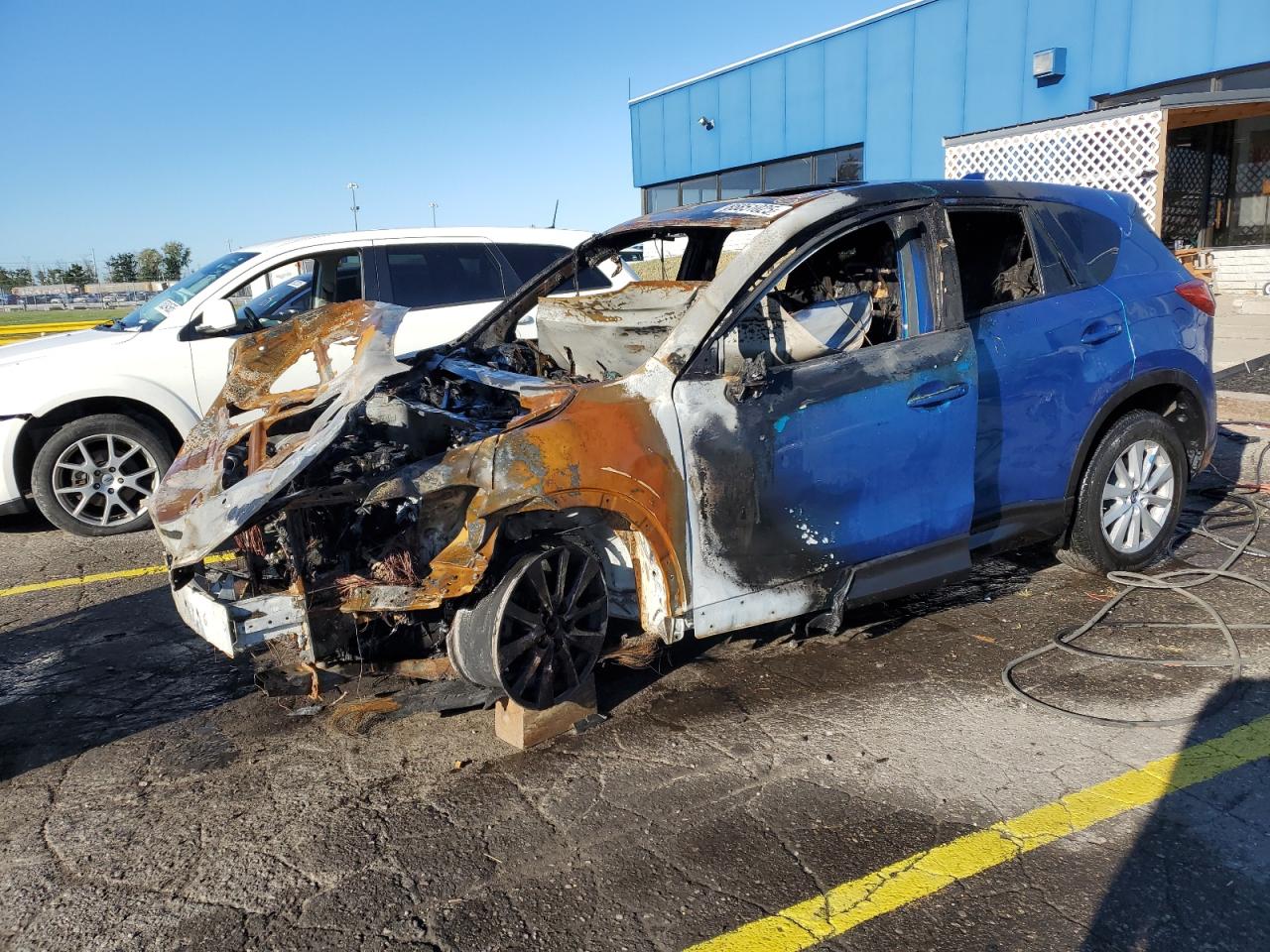2013 Mazda CX-5 Touring, VIN JM3KE4CE2D0134384 — Engine fire