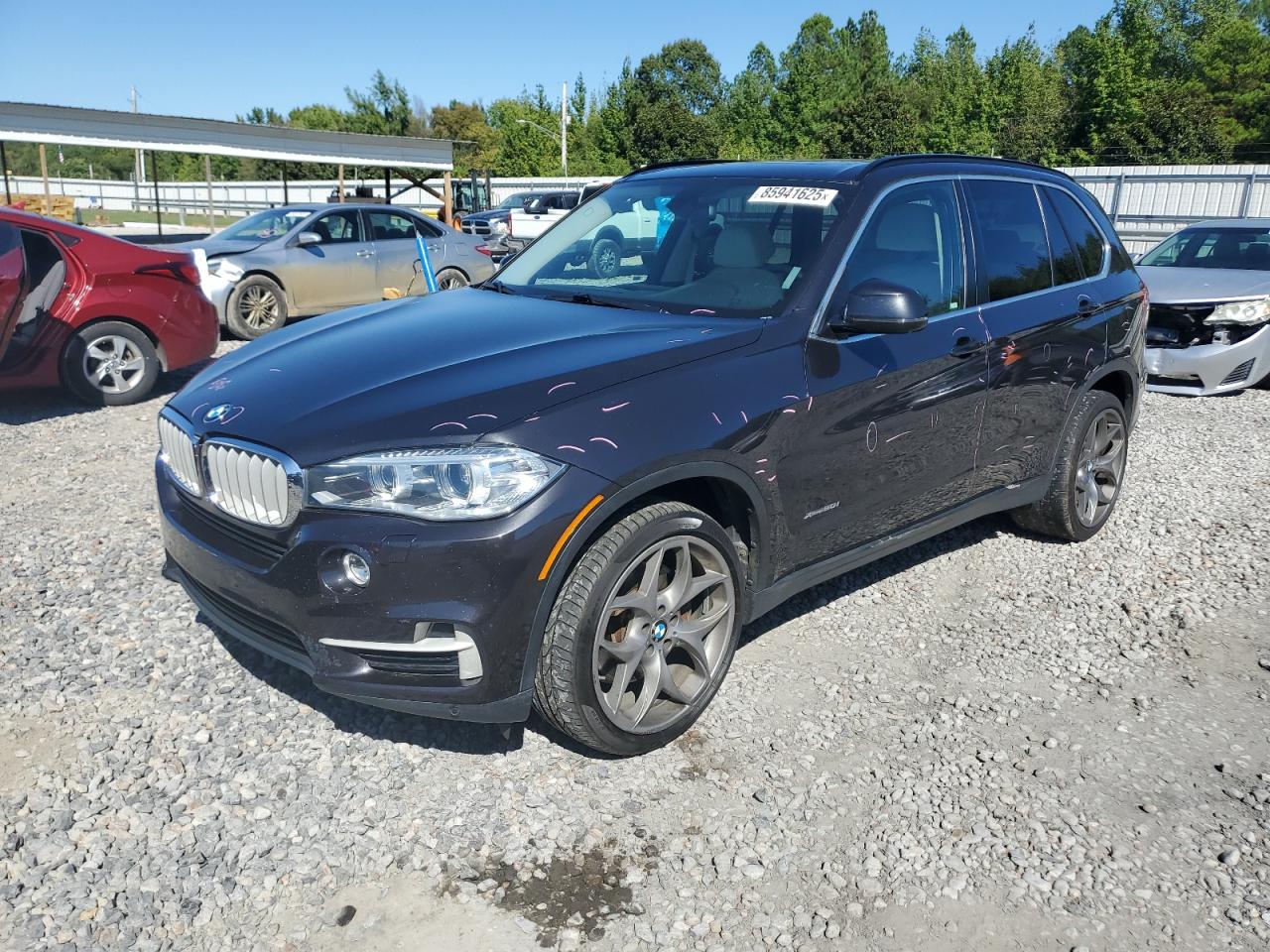 2015 BMW X5 xDrive50i, VIN 5UXKR6C51F0J77933 — Minor dents and scratches