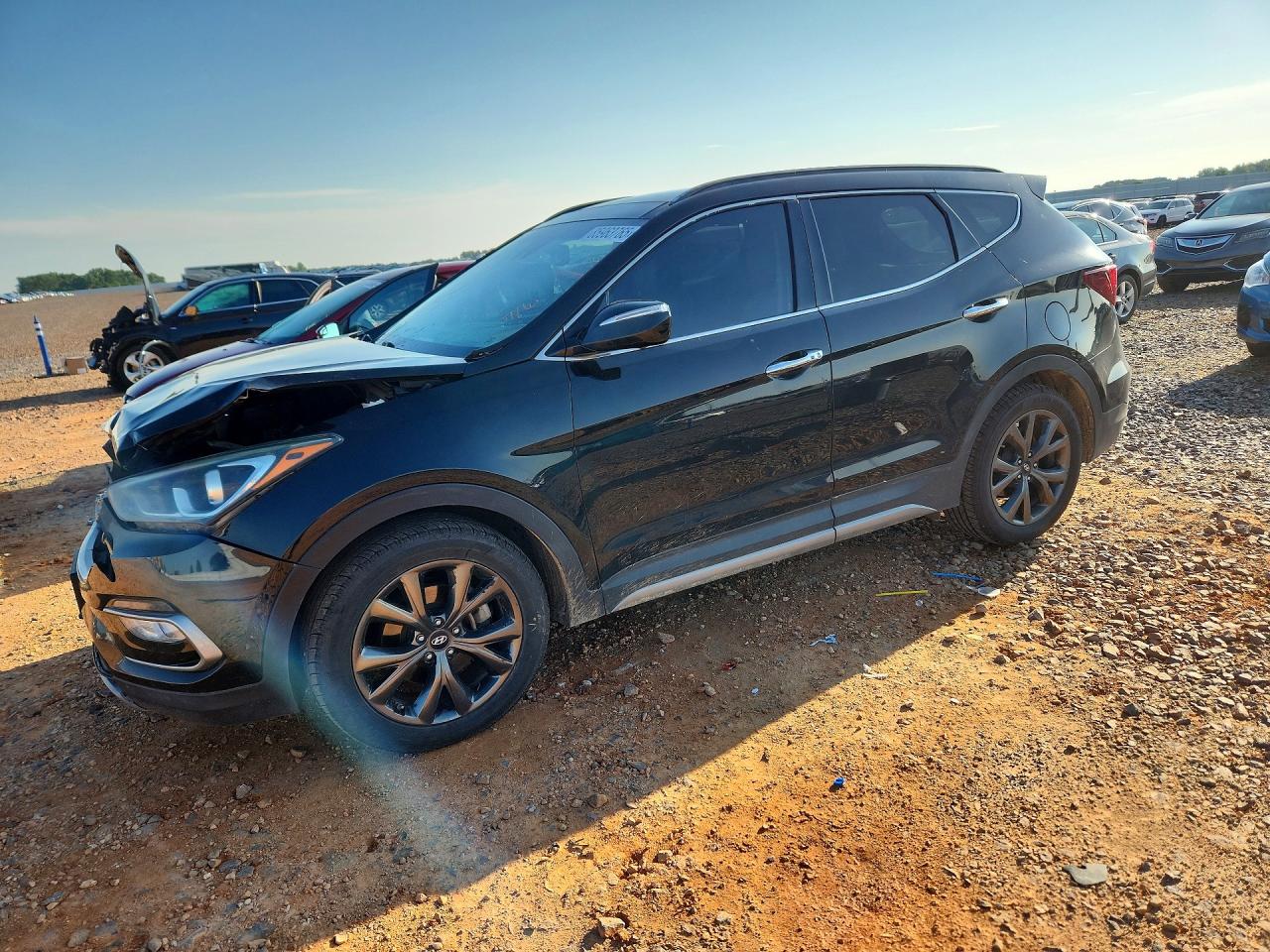 2017 Hyundai Santa Fe Ultimate, VIN 5XYZWDLA9HG473547 — Front end