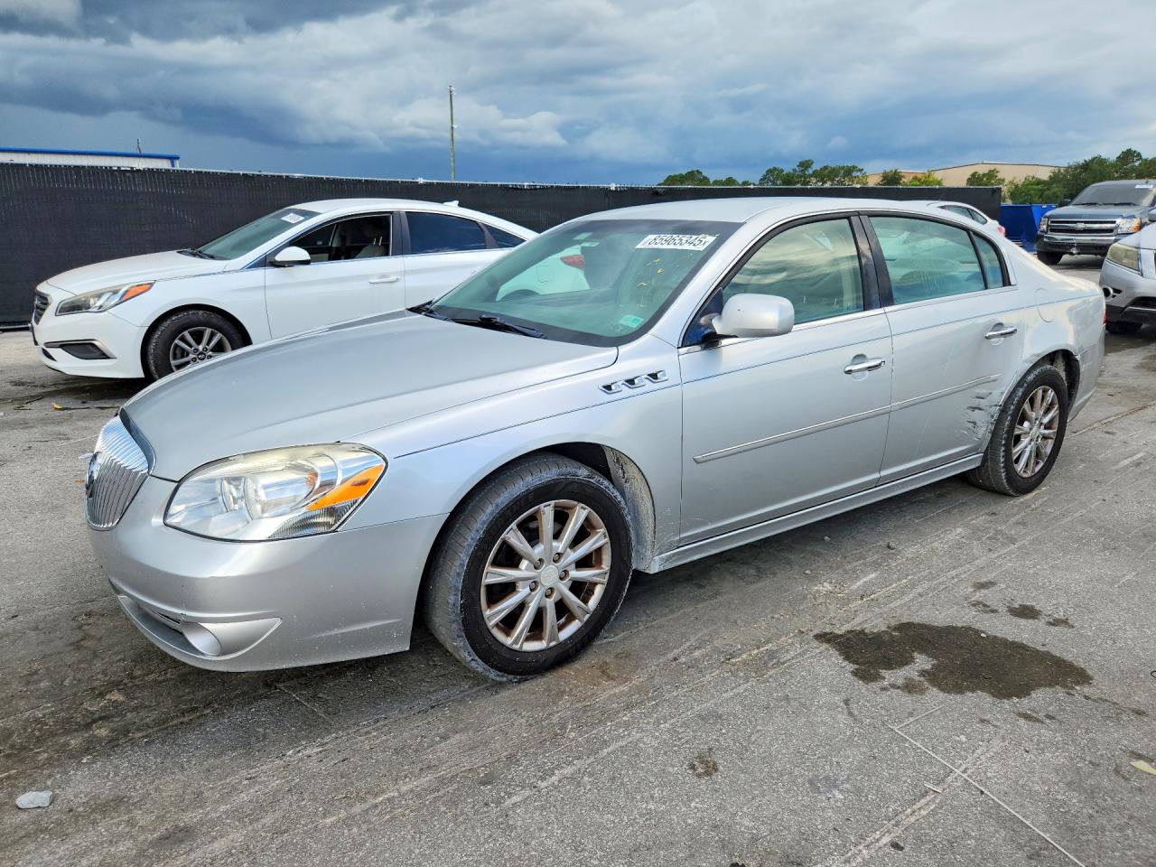2011 Buick Lucerne CXL, VIN 1G4HC5EM4BU134553 — Бок