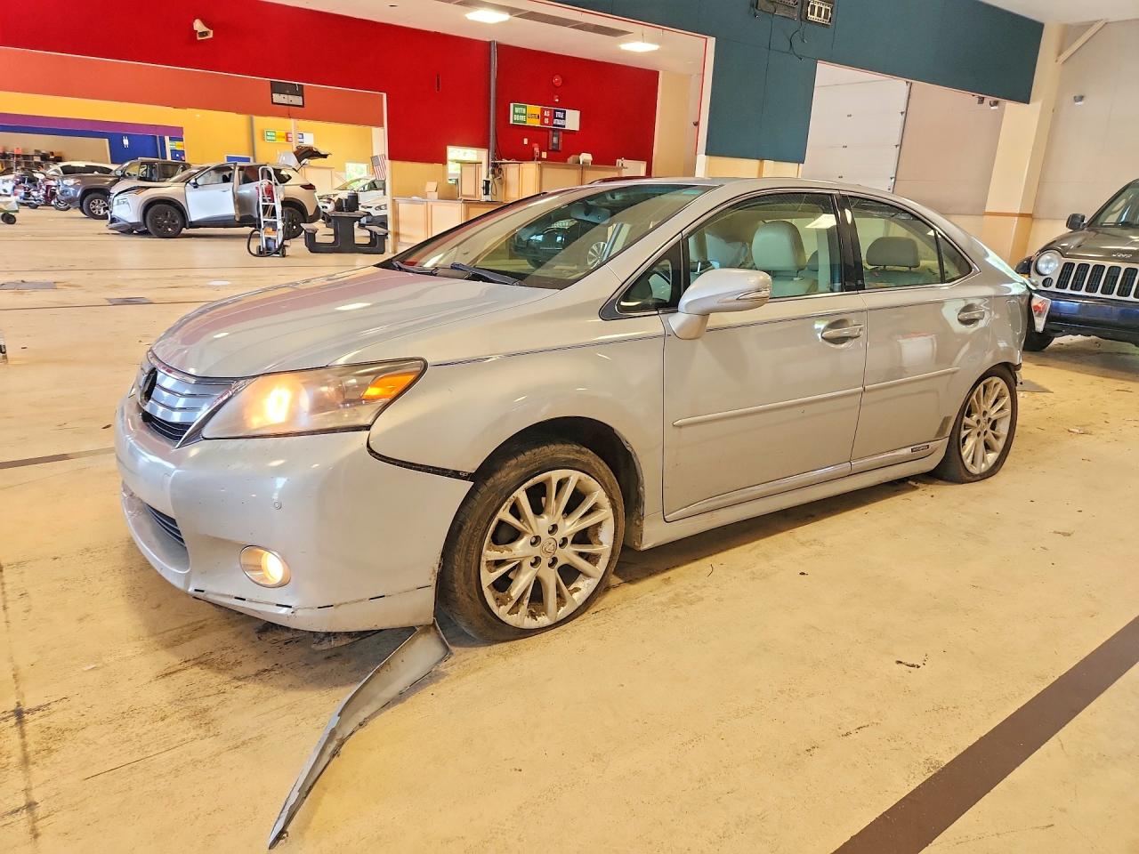 2010 Lexus HS 250h Premium, VIN JTHBB1BA3A2026109 — Side