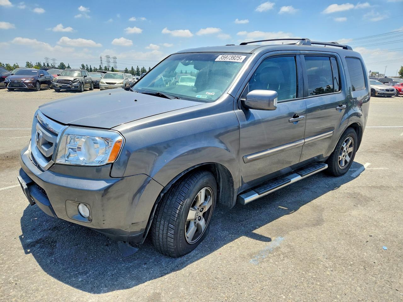 2011 Honda Pilot Touring, VIN 5FNYF4H9XBB090886 — Перед